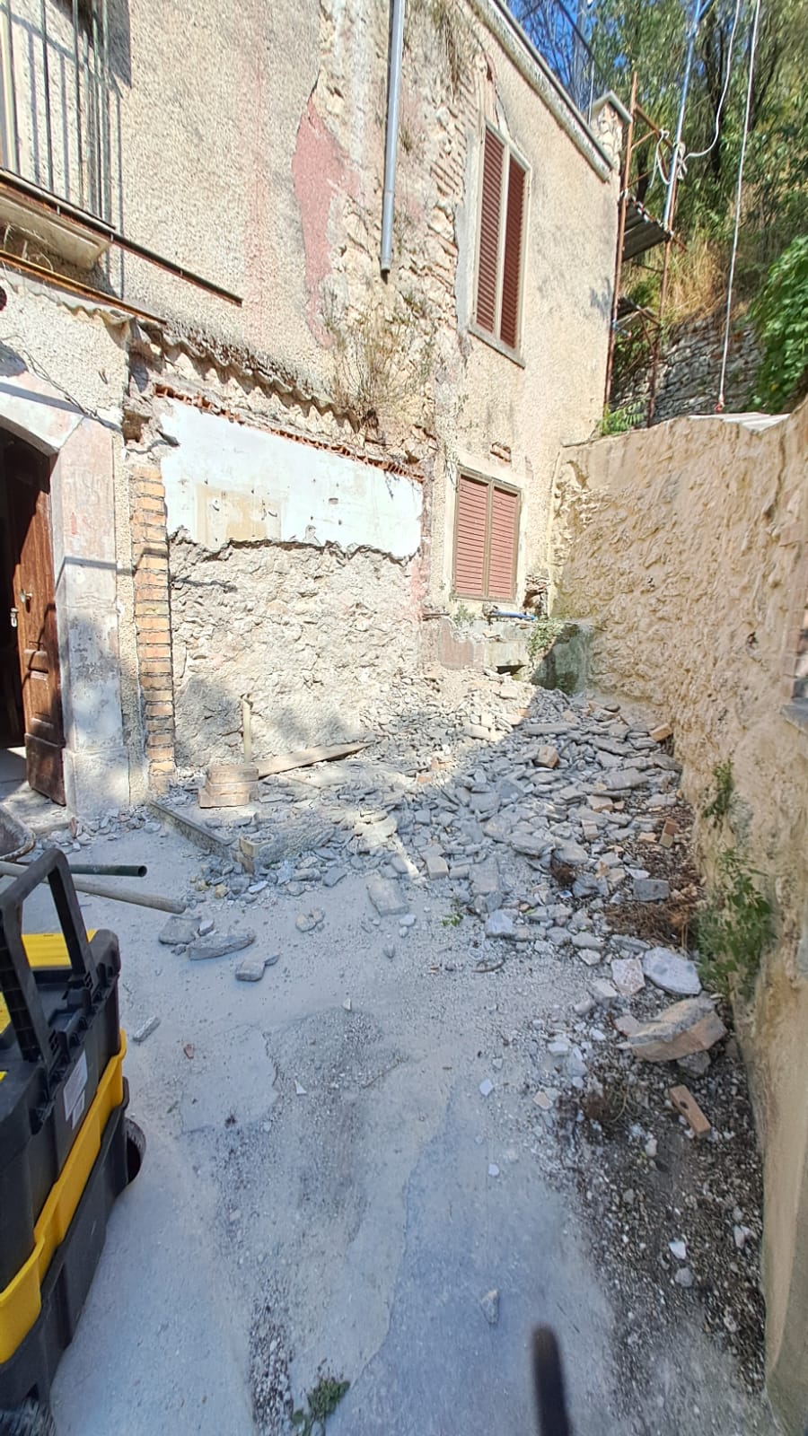 Final stages of demolishing the outside bathroom at our old Italian house