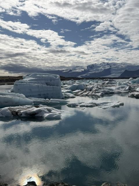 Icebergs floating through Jökulsárlón Glacier Lagoon toward Diamond Beach during our Iceland Ring Road trip.
