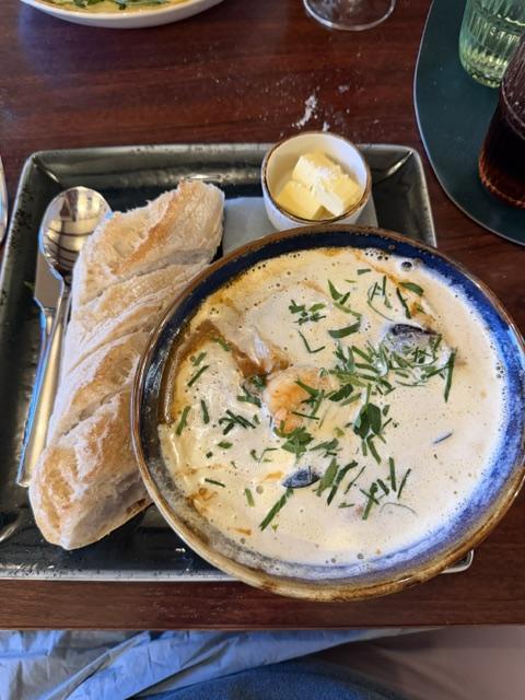 Creamy Icelandic langoustine soup served with bread and butter in Höfn.