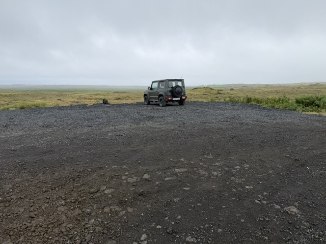 Small green Suzuki Jimny 4x4 we rented after returning our campervan in Iceland.
