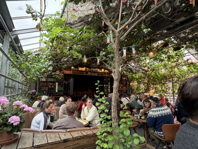 Dining among the tomato plants inside the Friðheimar greenhouse restaurant in Iceland.