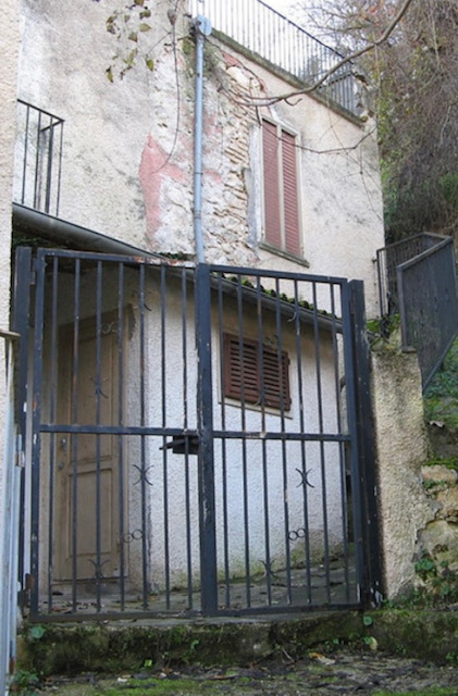 Exterior view of the outside bathroom at our old Italian house before demolition